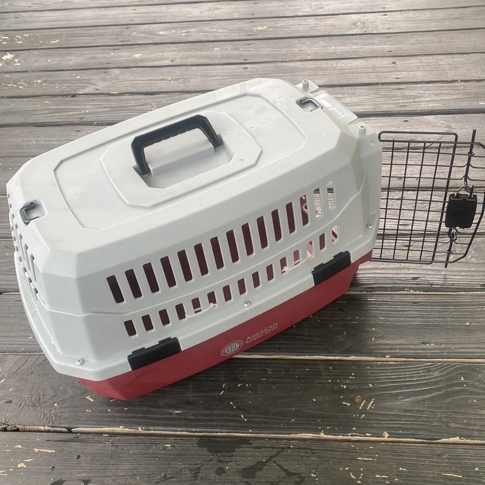 USED TRAVEL PET CARRIER INCLUDES SMALL PINK BOWL